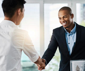 People shaking hands at a job interview