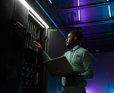 stock photo of man in a data center