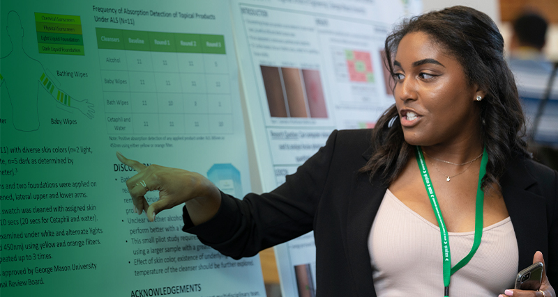 A Mason student presents their research during an event