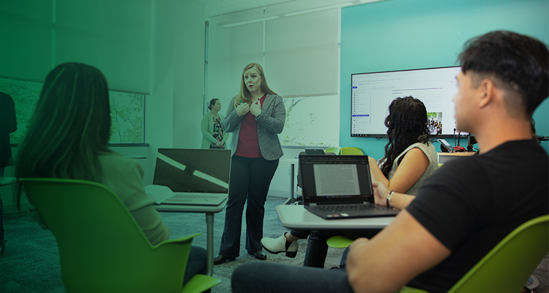 A professor speaks to a classroom of students in Horizon Hall