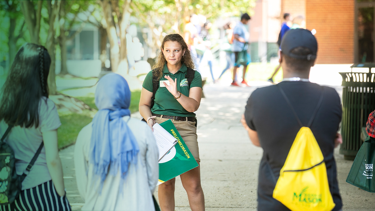 A Mason Ambassador guides a tour of Mason's Fairfax Campus.