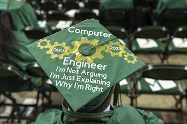 A graduate's cap reads "Computer Engineer, GMU 2023. I'm not arguing. I'm just explaining why I'm right."