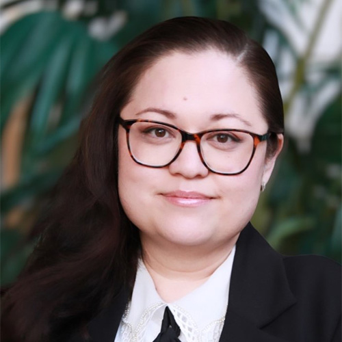 Shahnaz Kamberi in a black blazer and white shirt