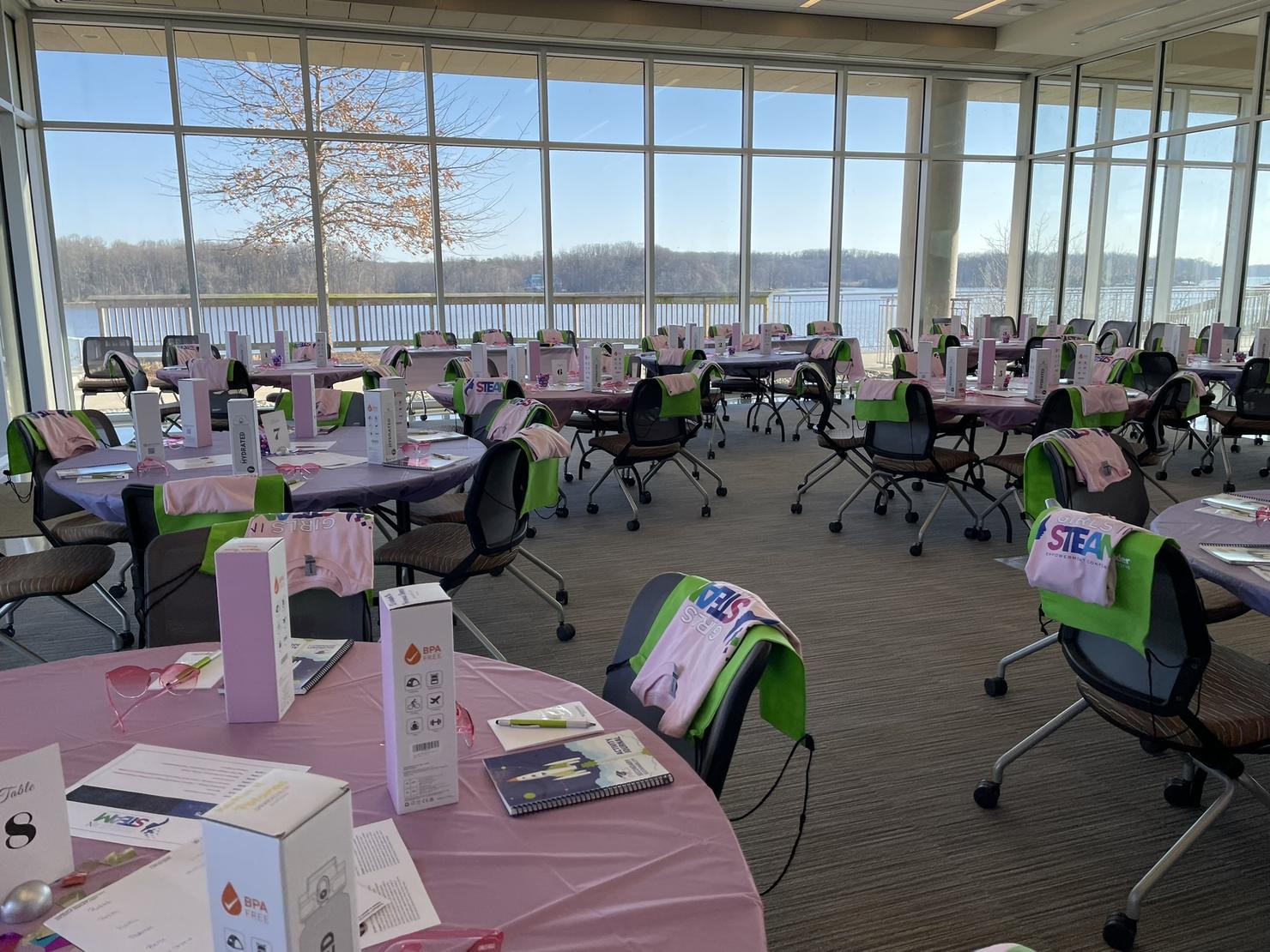 Room set up for the Girls in STEAM conference overlooking the waterfront