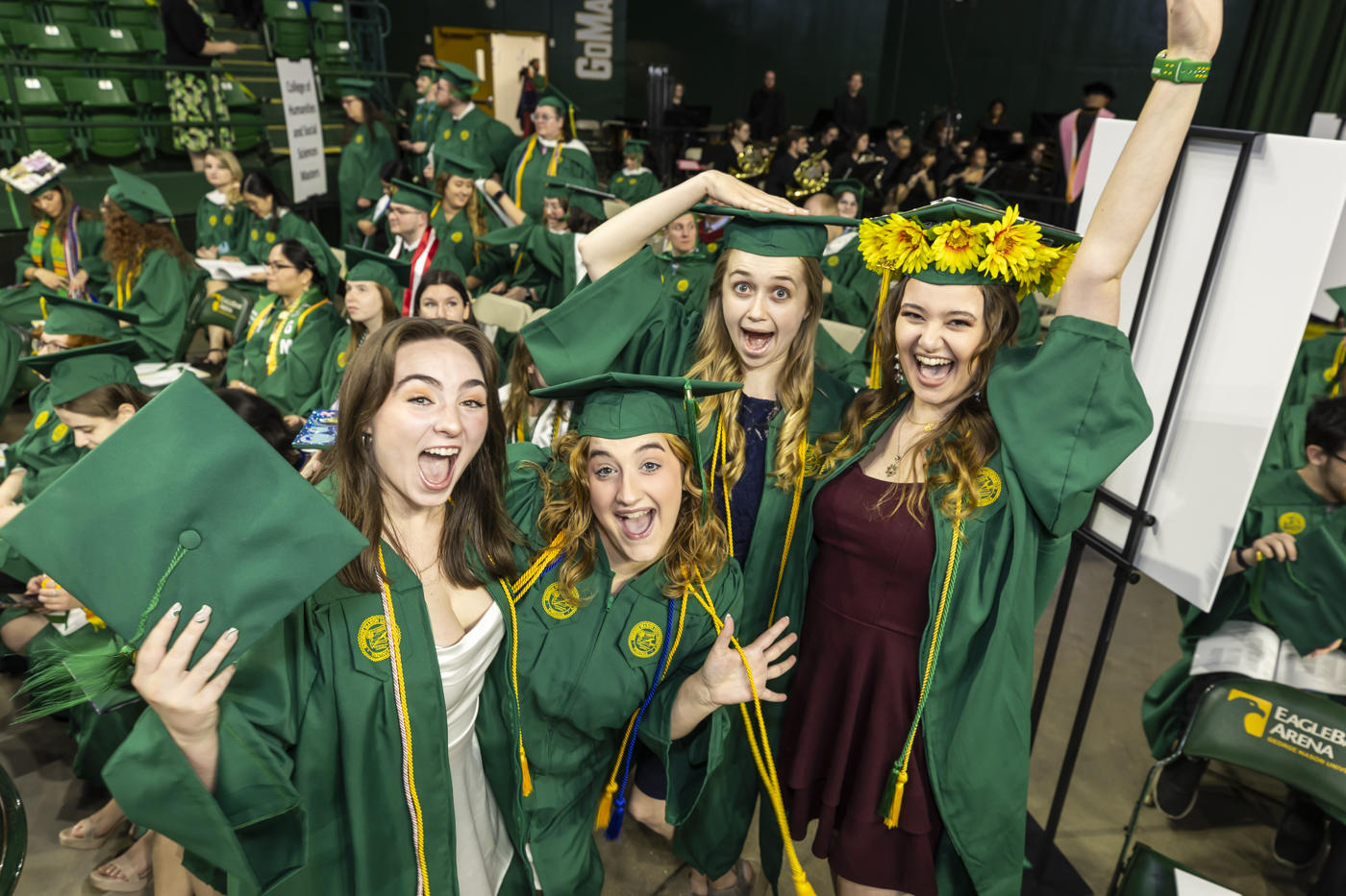 Graduates celebrate at the end of the Commencement ceremony