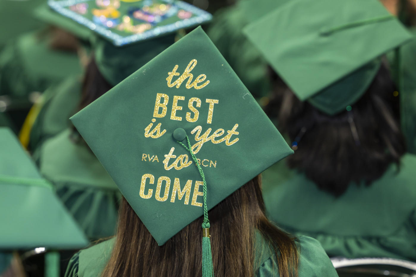 Graduation cap is decorated to say "The best is yet to come"