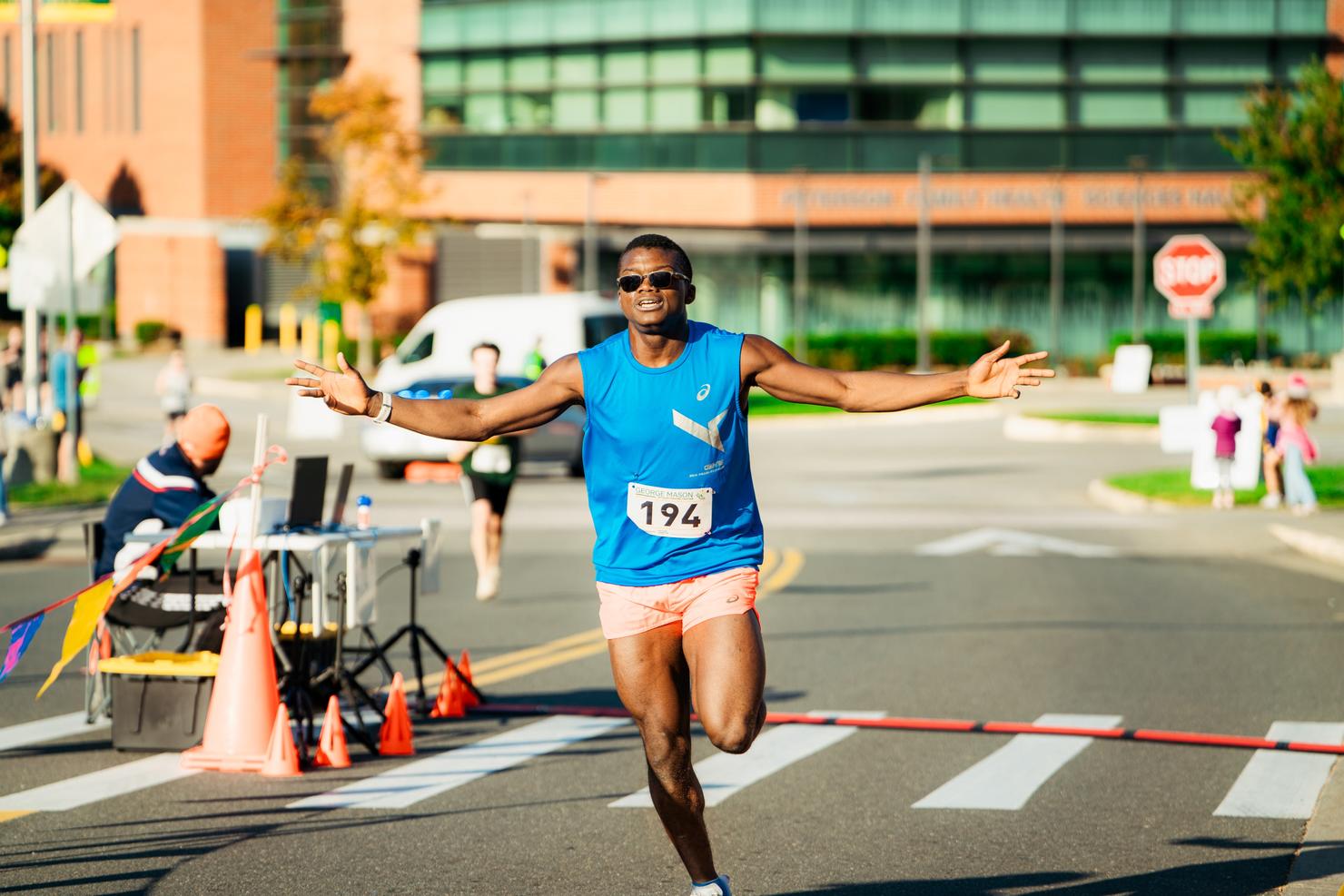 Race participant crosses the finish line