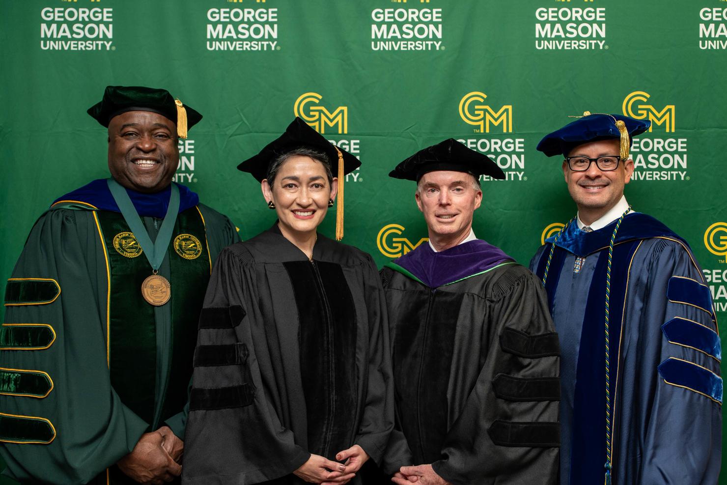 George Mason President Gregory Washington, Commencement speaker Martina Cheung, Rector of the Board of Visitors Charles "Cully" Stimson, and Provost James Antony
