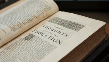 Historic book by John Locke in Mason's Fenwick Library.