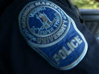 Closeup of Mason police shoulder badge
