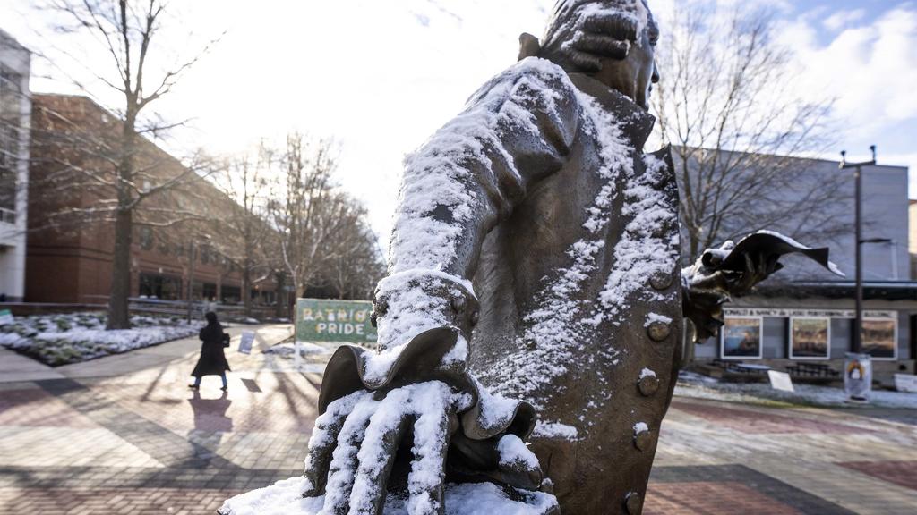 The statue of George Mason with a dusting of snow