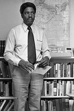 Darius Swann standing in a classroom