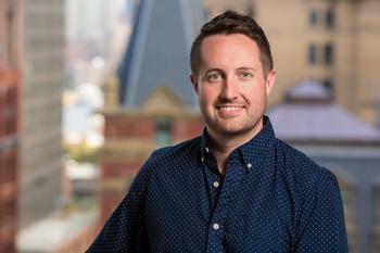 Headshot of Andrew Damer. 