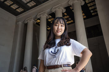 Yuhyun Sihn poses in the Lincoln Memorial