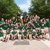 Group photo of orientation leaders surrounding the George Mason statue
